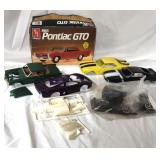 Box of Model Car Bodies, Parts and Plane