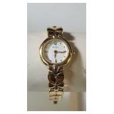 Vintage Bulova quartz wrist watch on gold tone