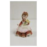 Vintage Lefton March Girl figurine chiped Flower