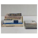 Assorted Lincoln paperbacks and DVD unopened