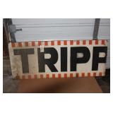 Tripp tin sign