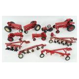 Group of Ertl International Tractors & Implements