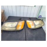 Pair of Early 2000s Subaru Headlights