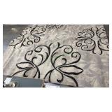 9.6ft x 7.6ft Tan and Black Area Rug