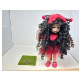VINTAGE PORCELAIN DOLL / LADYBUG