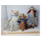 2 CERAMIC DOLLS AND A TEDDY BEAR DOLL