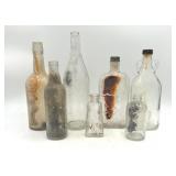 7 Vintage Clear Glass Bottles