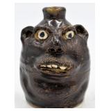 Marie Rogerï¿½s Small Tobacco Spit Brown Face Jug