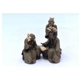 Asian Debate Clay Sculpture