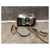 vintage Petri camera.