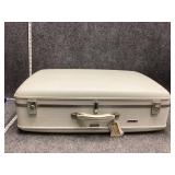 Tourister Tri-Taper hardshell suitcase
