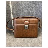 vintage brown leather or vinyl camera bag