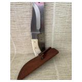Knife with leather case