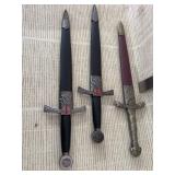 3 small swords with case