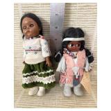 Two small native dolls