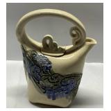 Decorative Ceramic Pitcher with Curved Handle and