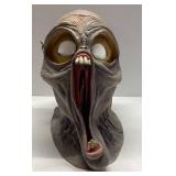 Horror-Themed Latex Mask with Distorted Features