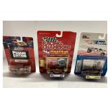 3 Die-Cast Racing Cars in Original Packaging