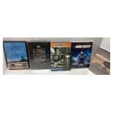 Five DVDs Featuring Motorsports Themes