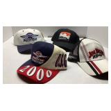 Four Branded Baseball Caps