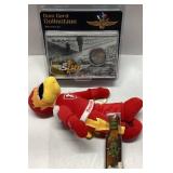 Lot Featuring FireHawk Plush, Coin Card, and Toy C