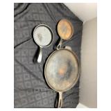Three Cast Iron Skillets