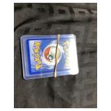 5 Pokï¿½mon Cards in Plastic Cases