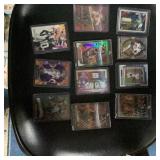 11 Mixed Sports Cards in Plastic Holders