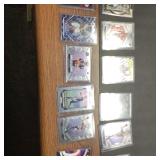 12 Football Rookie Cards in Plastic Sleeves