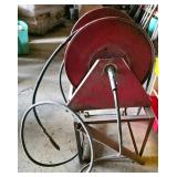 Speedaire Hose Reel on Rolling Stand with Rough Ho