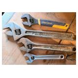 Four Adjustable Wrenches