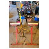 Red Adjustable Roller Stands and Yellow Work Light