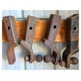 Four Rusted Trailer Hitch Ball Mounts