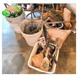Garage Items and Tools in Buckets and Containers