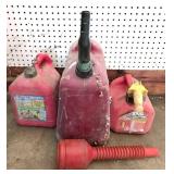 Three Plastic Gas Cans and Funnel