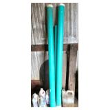 Lot with Two Green PVC Tubes and Jugs