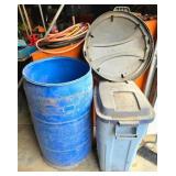 Blue Plastic Drum and Gray Trash Bin with Lids