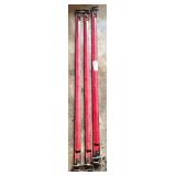 Three Red Metal Adjustable Support Posts