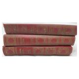 Three Vintage Hardcover Books with Red Binding