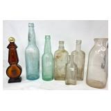 Seven Vintage Glass Bottles and Decanter