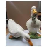 outdoor goose decor (one is broken)