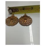 2 meritorious service pendants