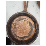 Small rusted Cast Iron Skillet