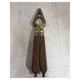 Wooden Brass Nutcracker Has Crack