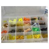 Tackle tray full of curly tail plastics