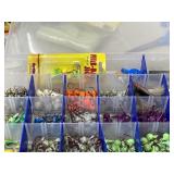 Tackle tray loaded with various jig heads. Total