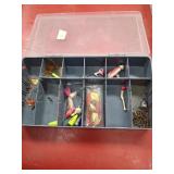 Container with jigs and hooks