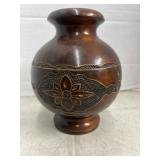 brown wooden vase