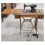 Singer Sewing Machine with Wooden Cabinet