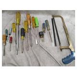 Various Screwdrivers and Hacksaw